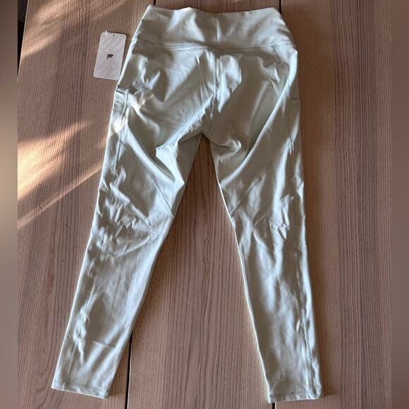 Fabletics High Waisted Side Pocket 7/8 legging in faded mint- Size Large NWT - Picture 2 of 4